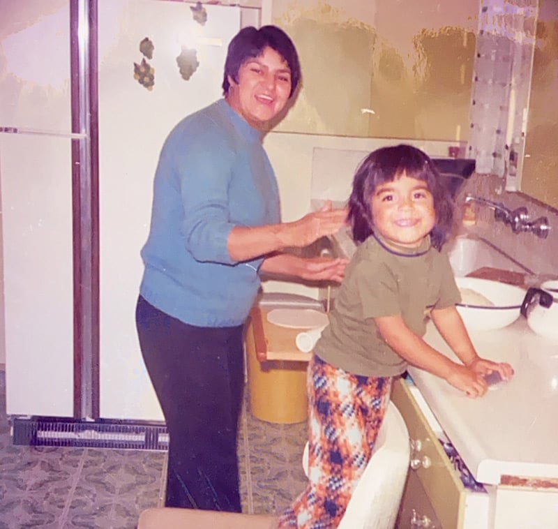 Abbey Lara making tortillas as a child with her mom in the background. Photo courtesy of Dr. Abbey Lara.