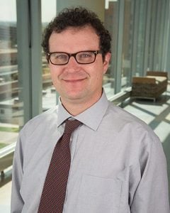 A photo of David Saxon, who helped this female address her high cholesterol in her 20s.